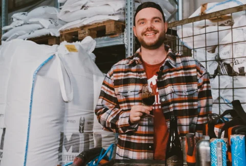 Image of our Brewer Rowan Tasting An Indulgence Stout Beer