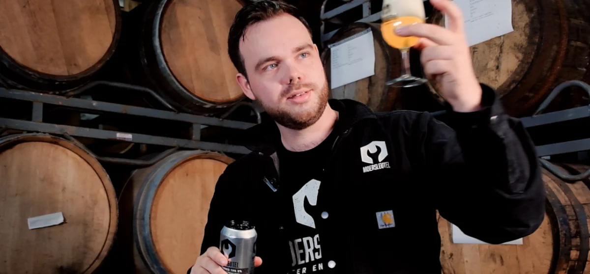 Image of our Brewer Rowan Looking At Beer Glass